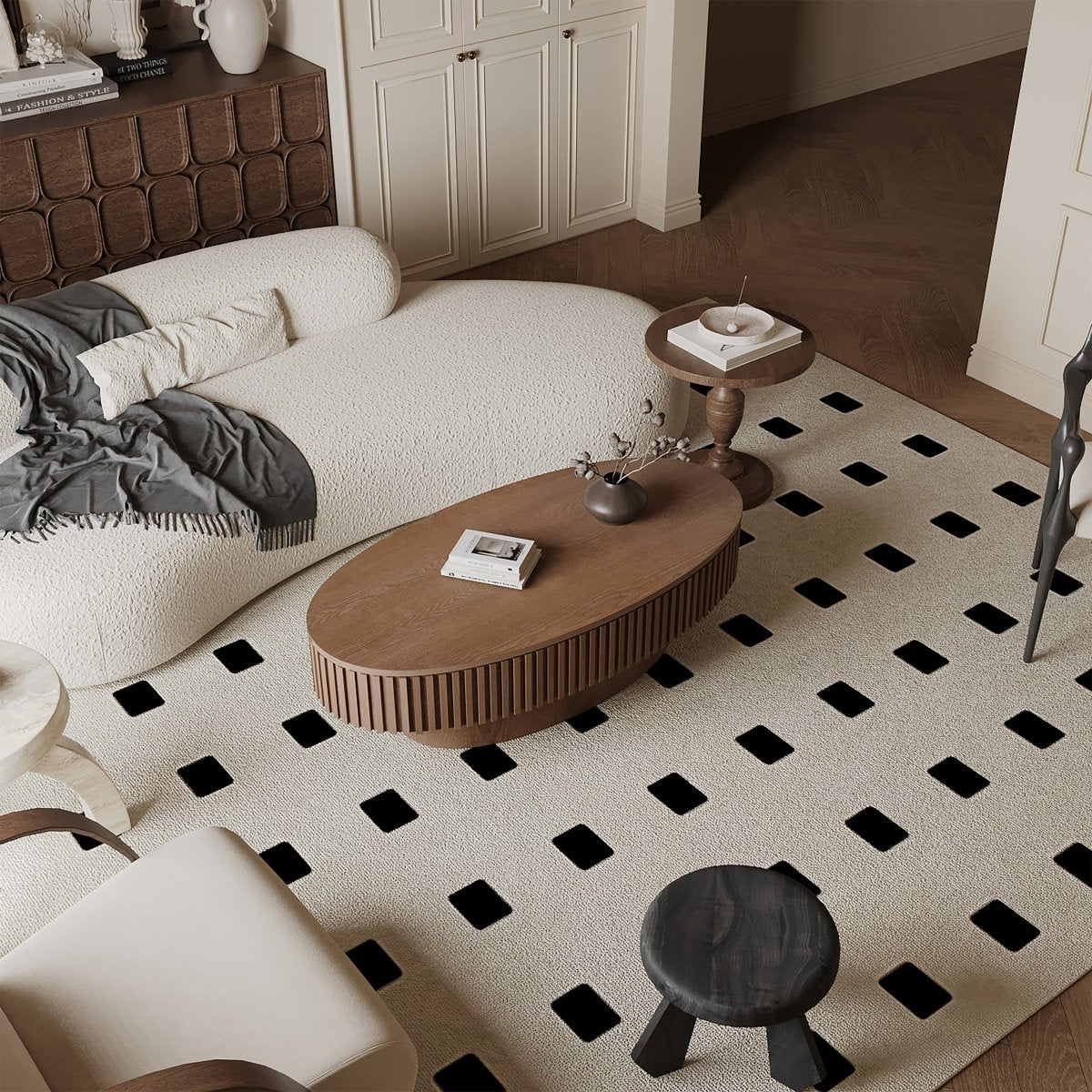 Overhead lifestyle view of the closed walnut oval coffee table showing its elongated oval top and fluted sides.