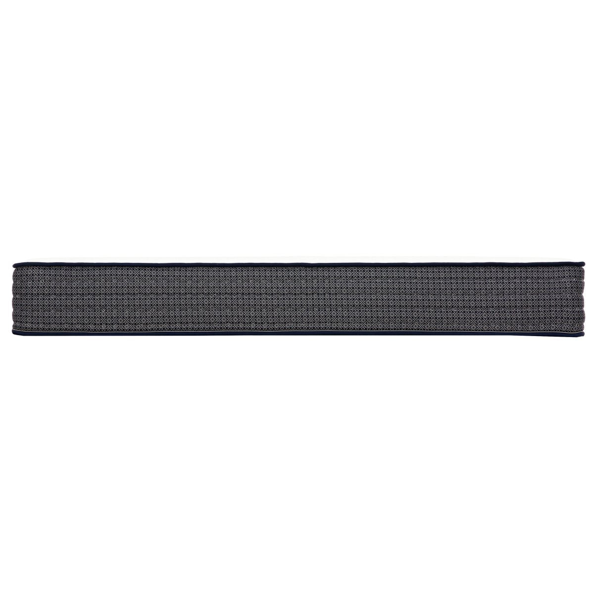 Straight side profile of the Polar Hybrid TT mattress with a dark gray patterned panel and navy edge piping.