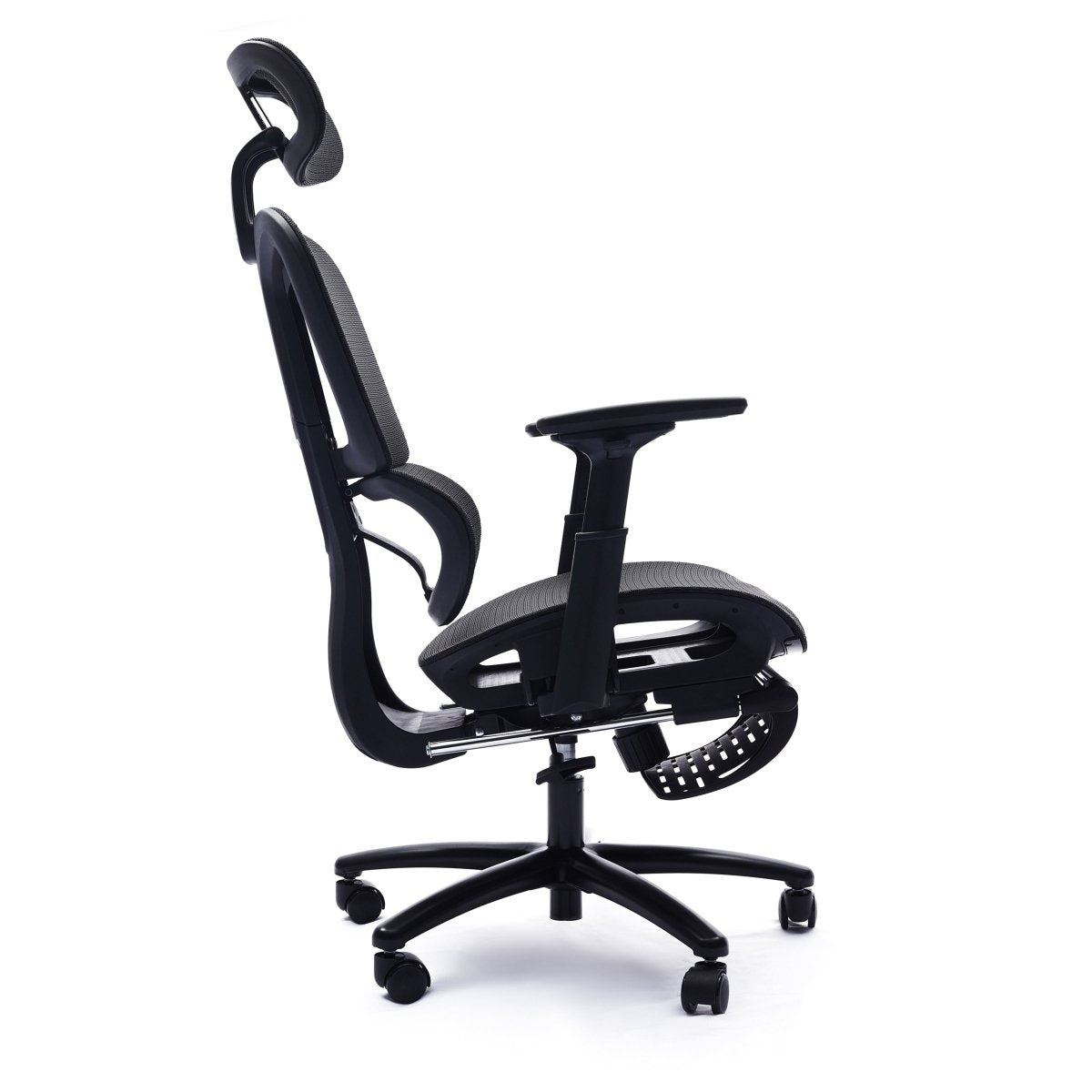 Side view of the Sealy Huxley black mesh office chair with a headrest, adjustable armrests, folded footrest and caster base.