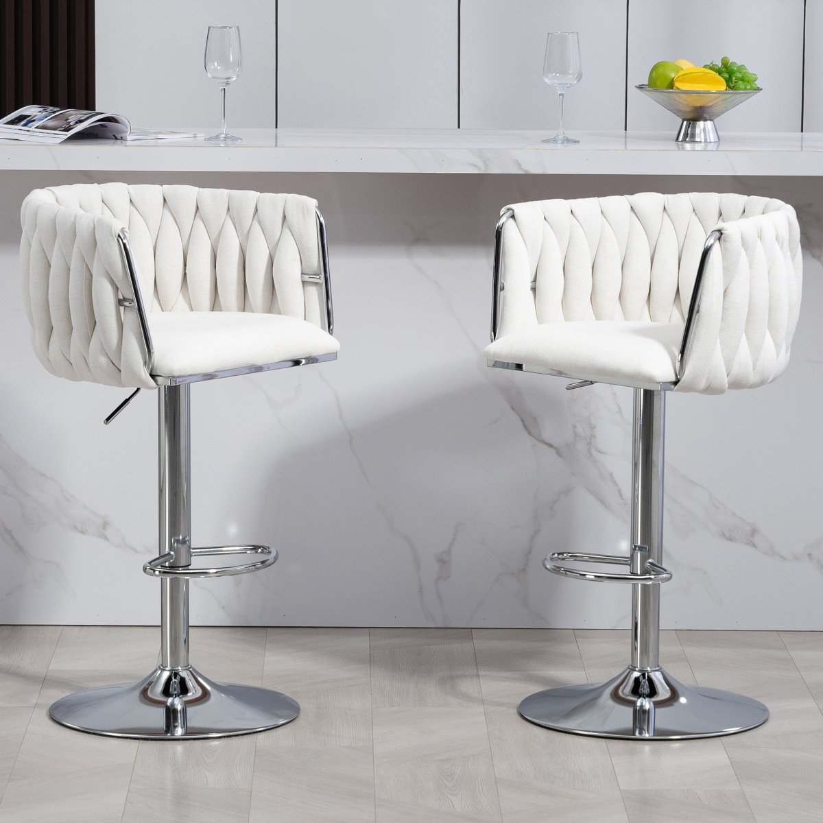 w2215p184992 - Front view of two beige adjustable bar stools at a kitchen counter